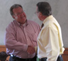 Dr. Steve Grant congratulates Wally Oyler.
